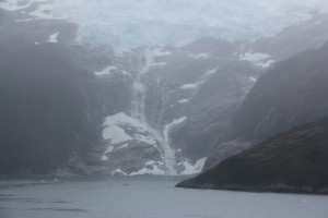Waterfall from retreating glacier. The mist got thicker the further we cruised down Glacier Alley.